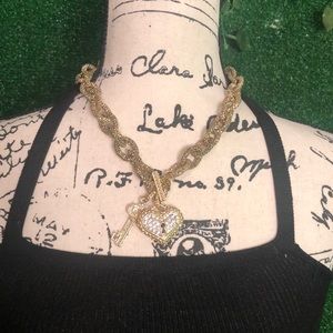 Gold link chain with heart locket n key